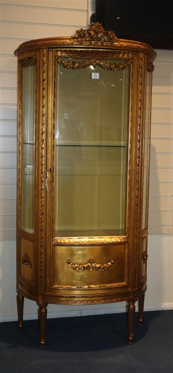 A Louis XVI style carved giltwood vitrine, W.2ft 11in. D.1ft 4in. H.5ft 9in.